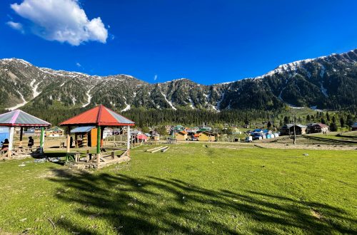 small-hut-with-red-roof-is-front-mountain